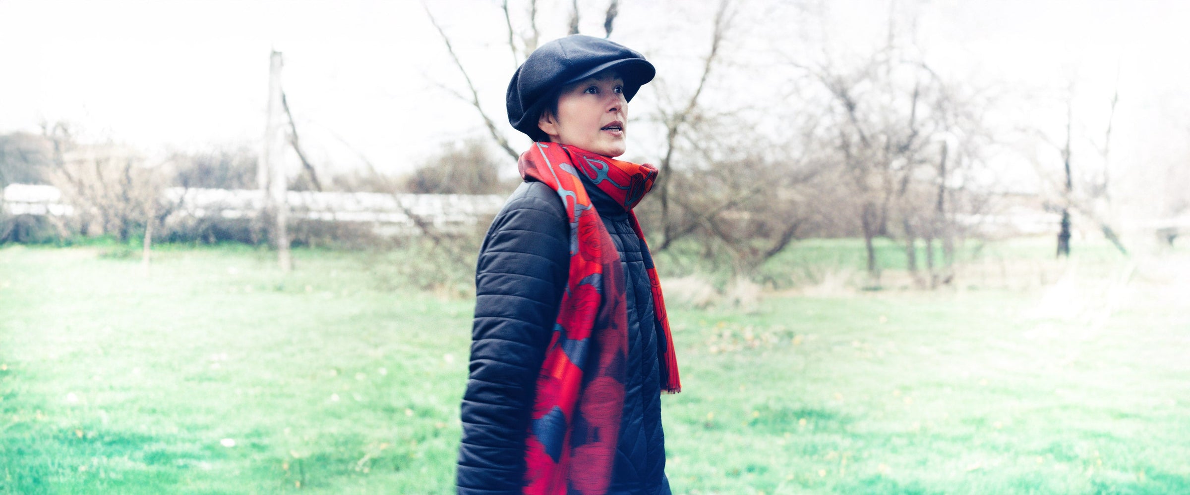 Beautiful model wears a Furious Goose stunning silk-wool scarf in the English countryside