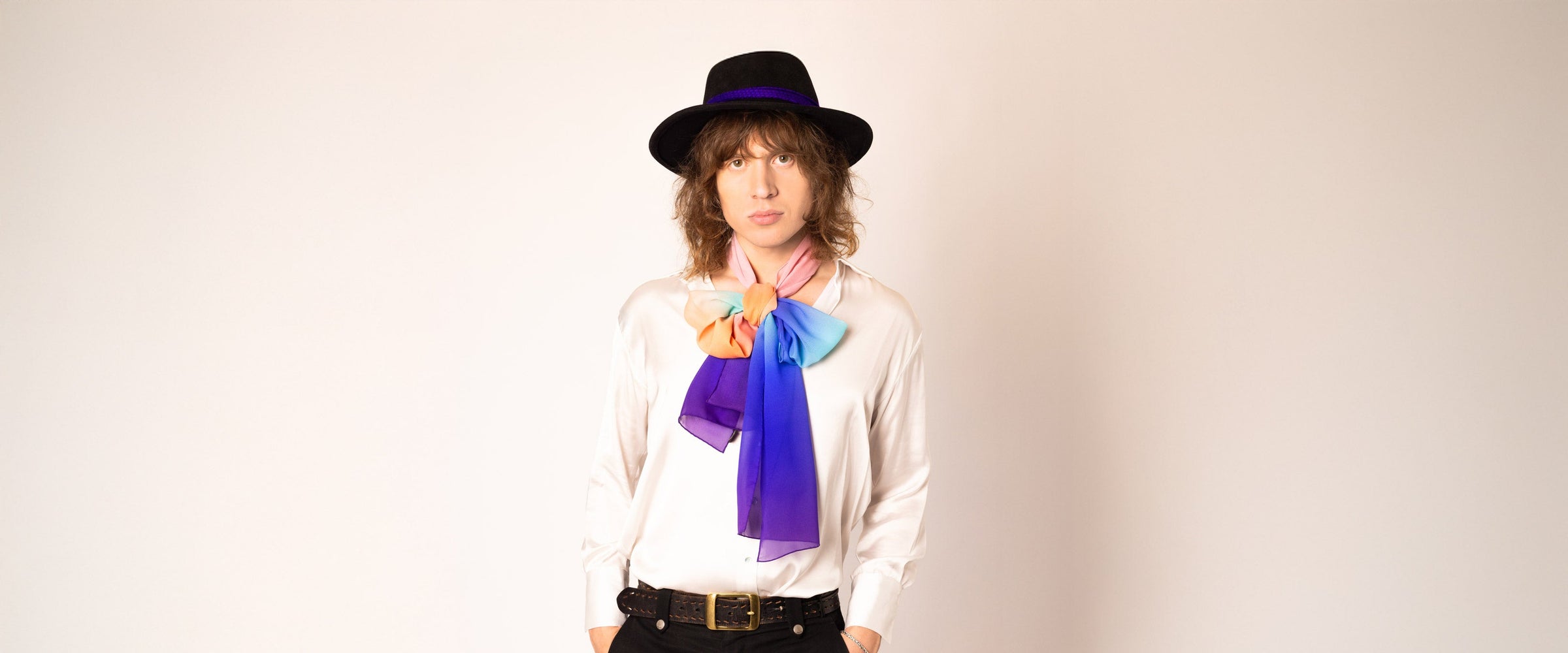 Rock star model wearing a chiffon scarf in a bow