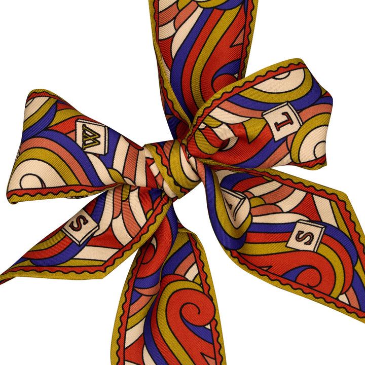 A bow tie or twilly scarf in regal heraldic colours. Red, Gold, Blue and White. Silk scarves, made in UK. London Furious Goose