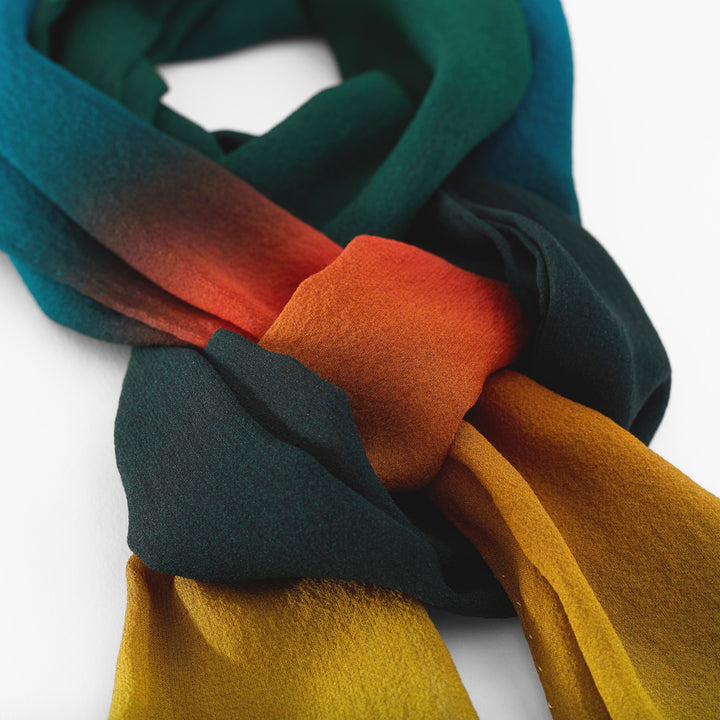 Detail of silk chiffon neck scarf. Hand rolled hems. Ombre colour field painting inspired. Green, Orange, Lime. Made in the UK – Furious Goose – London