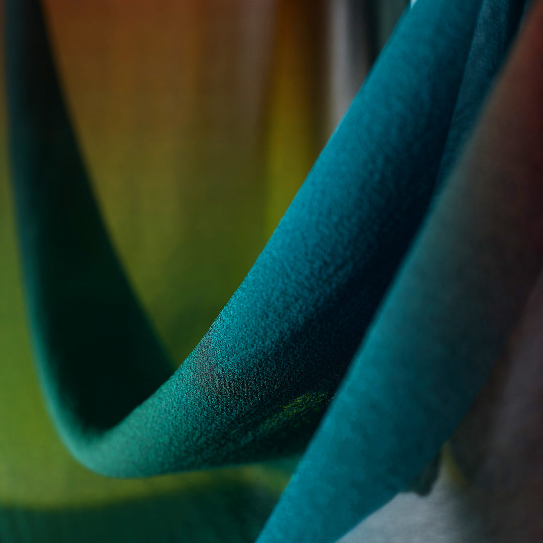 Closeup of silk chiffon ombre scarf in green, lime and orange. Premium silk accessories, London, Furious Goose