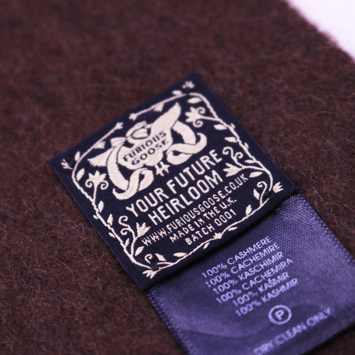 Cashmere scarf showing the label - Furious Goose Made in UK