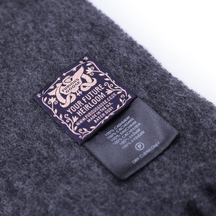 Cashmere scarf showing the woven label