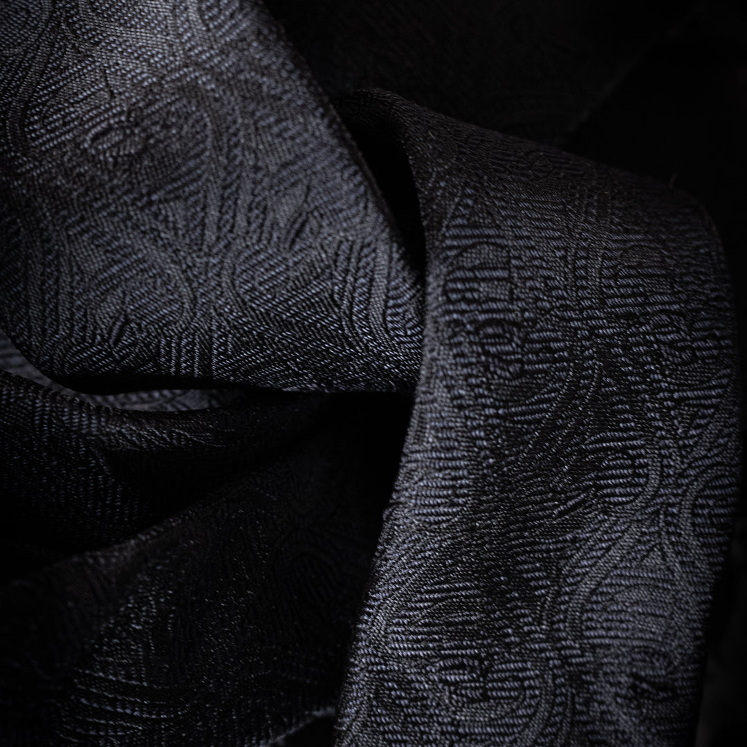 Close up of the Midnight tie showing the subtle texture woven into the silk