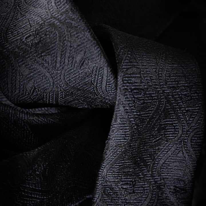 Close up of the Midnight tie showing the subtle texture woven into the silk