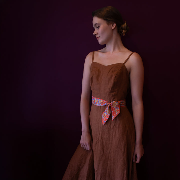 Worn as a belt this is a luxury silk ribbon scarf in orange and lilac, 100% Pure Silk Scarves, London, England | Furious Goose